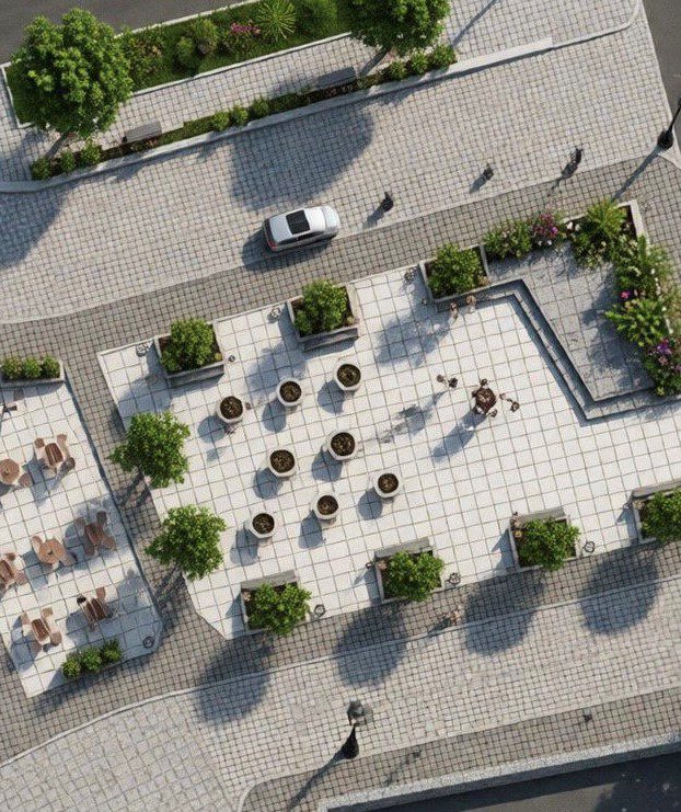 Vista aérea de un diseño urbanístico con nuevas áreas peatonales, vegetación, mobiliario urbano y pavimentación renovada.