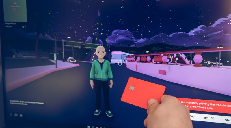 Russia Moscow 19.01.2022 Logo of metaverse. Investing in digital universe, real estate. Buy land in virtual world. Blockchain nft cryptocurrency.Man with mobile phone.Play-to-earn.Buing accessories.