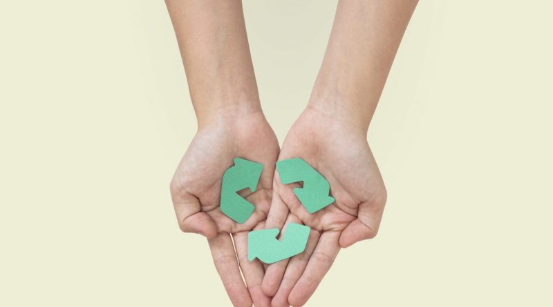 Hands cupping recycle  save the environment campaign