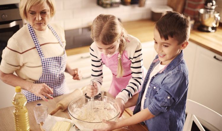 High angle view of two helpers and grandmother